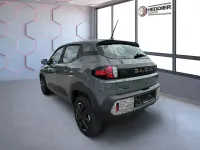 Gebraucht Dacia Spring Extreme 47 kW (65 PS) 2025 Olivgrün Kleinwagen