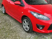 Usado Mazda 2 102 HP (75 kW) 2009 Vermelho Citadino