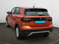Gebraucht VW T-Cross Basis 95 PS (69 kW) 2023 Energetic orange metallic SUV