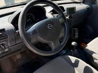 Second-hand Opel Combo 97 CP (71 kW) 2006 Argintiu Monovolum