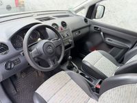 Second-hand VW Caddy 109 CP (80 kW) 2011 Argintiu Monovolum