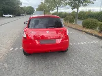 Gebraucht Suzuki Swift 90 PS (66 kW) 2013 Rot Kleinwagen
