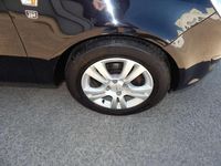 Używany Opel Corsa Edition 69 KM (50 kW) 2011 Czarny Hatchback