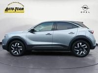Gebraucht Opel Mokka-e Elegance 100 kW (136 PS) 2023 Kontrast grau metallic SUV