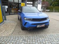 Gebraucht Opel Mokka 131 PS (96 kW) 2024 Voltaik blau metallic SUV