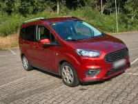 Gebraucht Ford Tourneo Courier 100 PS (73 kW) 2018 Orange Van / Kleinbus