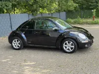 Gebraucht VW New Beetle 102 PS (75 kW) 2009 Schwarz Kleinwagen