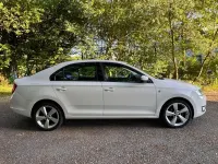 Używany Skoda Rapid Ambition 86 KM (63 kW) 2013 Biały Hatchback
