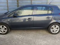 Usado Opel Corsa Catch Me 75 HP (55 kW) 2008 Cinzento Citadino