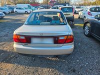 Second-hand Mazda 323 1996 Auriu Berlinǎ