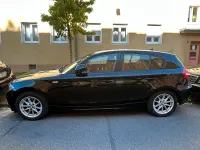 Gebraucht BMW 116 122 PS (89 kW) 2010 Schwarz Kleinwagen