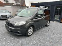 Gebraucht Ford Tourneo Courier Titanium 101 PS (74 kW) 2015 Magneticgrau (metallic) Van / Kleinbus