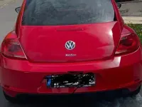Używany VW Beetle 105 KM (77 kW) 2012 Czerwony Hatchback