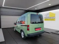 Używany Opel Combo 90 KM (66 kW) 2010 Zielony Minivan