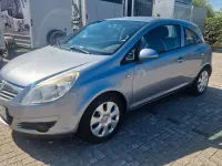 Używany Opel Corsa Edition 80 KM (58 kW) 2009 Srebrny Hatchback