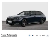 Gebraucht BMW 550e M Sport 313 PS (230 kW) 2025 Carbonschwarz Kombi