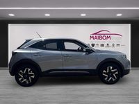 Gebraucht Opel Mokka-e Elegance 100 kW (136 PS) 2021 Kontrast grau/quarz silber SUV