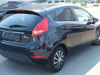 Gebraucht Ford Fiesta Titanium 69 PS (50 kW) 2010 Pantherschwarz metallic Kleinwagen