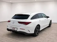 Gebraucht Mercedes CLA200 AMG 163 PS (119 kW) 2021 Digitalweiss  metalliclack Coupé
