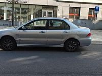 Gebraucht Mitsubishi Lancer Invite 98 PS (72 kW) 2005 Silber Kombi