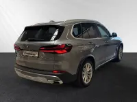 Gebraucht BMW X5 Sport Line 489 PS (359 kW) 2024 Skyscraper grau metallic SUV