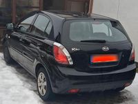 Gebraucht Kia Rio 96 PS (70 kW) 2010 Schwarz Kleinwagen