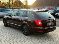Używany Skoda Superb 140 KM (102 kW) 2012 Czerwony Kombi
