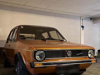 Second-hand VW Golf I GTI 75 CP (55 kW) 1976 Auriu Hatchback