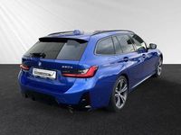Gebraucht BMW 330e M Sport 292 PS (214 kW) 2024 Portimao blau metallic Kombi