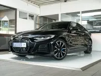 Używany BMW i4 Performance 400 kW (544 KM) 2023 Czarny Sedan/Limuzyna