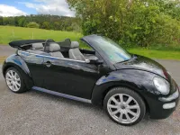 Gebraucht VW New Beetle 116 PS (85 kW) 2004 Schwarz Kleinwagen