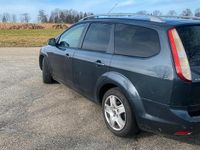 Gebraucht Ford Focus 115 PS (84 kW) 2010 Grau Kombi