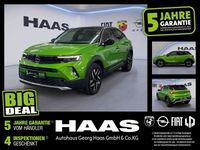 Gebraucht Opel Mokka-e Elegance 100 kW (136 PS) 2022 Matcha green/ikone gruen (metallic) SUV