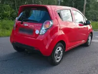 Usado Chevrolet Spark 68 HP (50 kW) 2010 Vermelho Citadino