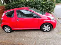 Gebraucht Toyota Aygo 68 PS (50 kW) 2009 Rot Kleinwagen