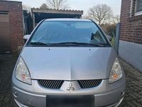 Second-hand Mitsubishi Colt 75 CP (55 kW) 2007 Argintiu Hatchback