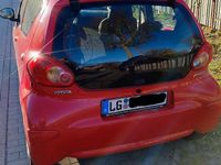 Gebraucht Toyota Aygo 68 PS (50 kW) 2007 Rot Kleinwagen
