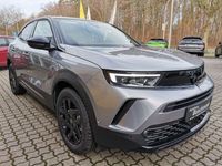 Gebraucht Opel Mokka 101 PS (74 kW) 2024 Kontrast grau metallic SUV