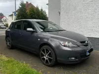 Używany Mazda 3 Inclusive 105 KM (77 kW) 2009 Szary Sedan/Limuzyna