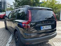 Gebraucht Dacia Jogger Extreme 110 PS (80 kW) 2024 Schwarz (perlmuttschwarz metallic) Van / Kleinbus