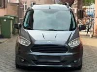 Gebraucht Ford Tourneo Courier 101 PS (74 kW) 2015 Grau Van / Kleinbus