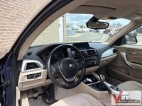 Second-hand BMW 114 102 CP (75 kW) 2013 Albastru Hatchback