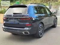 Gebraucht BMW X7 Sport Line 381 PS (280 kW) 2023 Tansanitblau meta (metallic) SUV