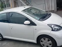 Gebraucht Toyota Aygo 65 PS (47 kW) 2011 Weiß Kleinwagen