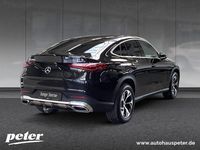 Gebraucht Mercedes GLC300e Advanced 313 PS (230 kW) 2024 Metalliclack obsidianschwarz Coupé