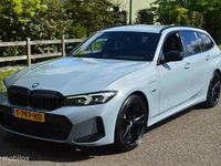 Gebraucht BMW 320e Performance 204 PS (150 kW) 2023 Grau Kombi