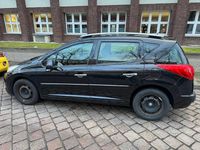 Gebraucht Peugeot 207 95 PS (69 kW) 2011 Schwarz Kombi