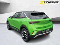 Gebraucht Opel Mokka-e Elegance 100 kW (136 PS) 2021 Matcha green/ikone gruen SUV