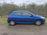 Gebraucht Peugeot 206+ 73 PS (53 kW) 2011 Blau Kleinwagen