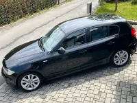 Używany BMW 116 122 KM (89 kW) 2009 Czarny Hatchback